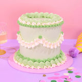 Vintage Cake - Tonal Colour with six layers of sponge and green and white Swiss Meringue Buttercream decor.